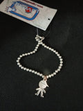 BRACCIALE C/BIMBO/A PERLINE ARGENTATE