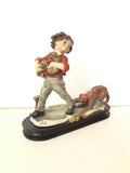 BIMBO CON CAGNOLINI IN RESINA TIPO CAPODIMONTE H20XL20XP8 CM ( LEGGERA IMPERFEZIONE )