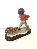 BIMBO CON CAGNOLINI IN RESINA TIPO CAPODIMONTE H20XL20XP8 CM ( LEGGERA IMPERFEZIONE )