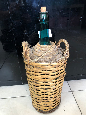 BOTTIGLIONE IN VETRO CON RIVESTIMENTO TIPO INTRECCIATO H55XL18XP18 CM