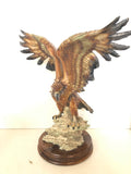 SCULTURA AQUILA IN RESINA CON ALI SPIEGATE L40XH43CM
