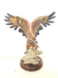SCULTURA AQUILA IN RESINA CON ALI SPIEGATE L40XH43CM