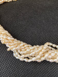 GIROCOLLO INTRECCIATO PERLINE BIANCHE
