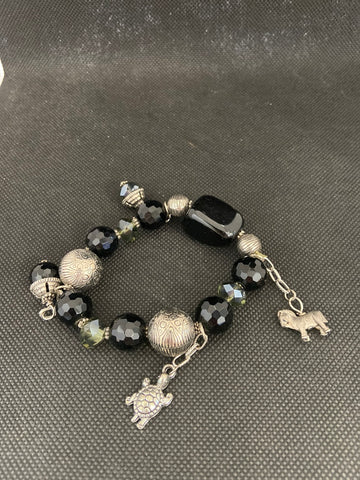 BRACCIALE PIETRE NERE/ARGENTATE C/CIONDOLI
