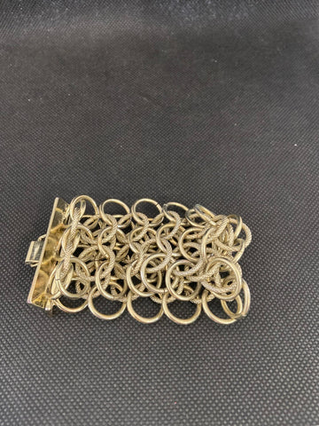 BRACCIALE LARGO CERCHIETTI DORATI