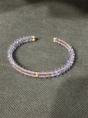 BRACCIALE SEMIAPERTO RIGIDO TIPO SWAROVSKI VIOLA
