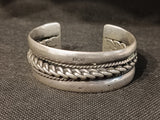 BRACCIALE SEMIAPERTO RIGIDO IN ARGENTO ETNICO