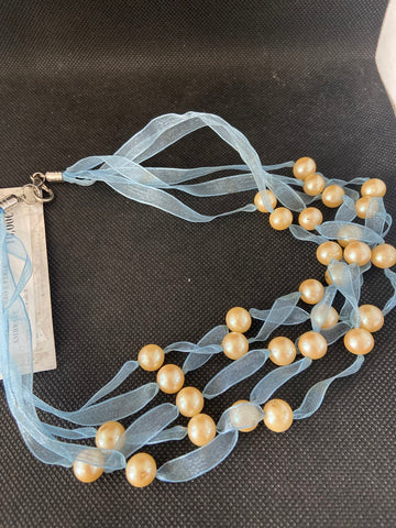 COLLANA MULTIFILI IN TULLE AZZURRO E PERLE AMBRATE