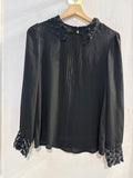 MAGLIA BENETTON TGXS NERO C/RIPORTO MACRAME'