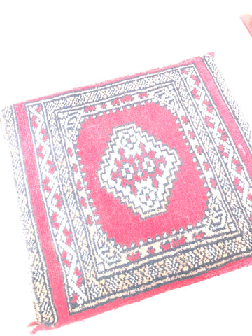 TAPPETINO IN LANA L41X32 CM