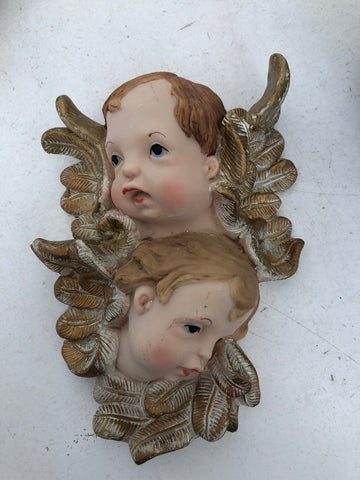 VOLTI PUTTI IN RESINA H15XL10XP2 CM