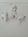 FAMIGLIA CANI IN PORCELLANA 4 PZ H5 CM