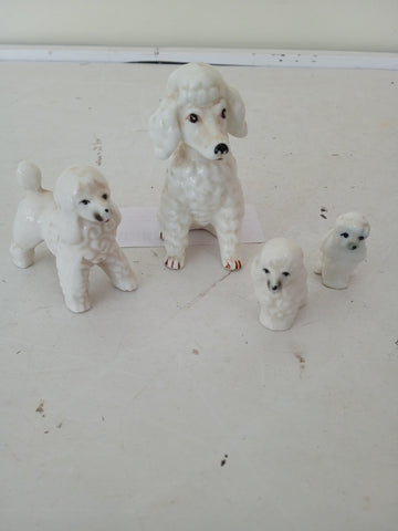 FAMIGLIA CANI IN PORCELLANA 4 PZ H5 CM