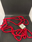 COLLANA LUNGA MULTIFILI SFERE ROSSE C/APPLICAZIONE TRINACRIA