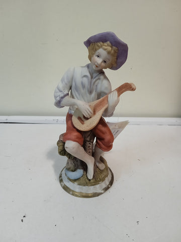 STATUA MUSICISTA TIPO CAPODIMONTE H20XL8XP8 CM