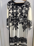ABITO MILVA TGL BIANCO/NERO STAMPATO EFF.PIZZO