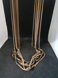 COLLANA MULTIFILI CATENINE NERO DORATO