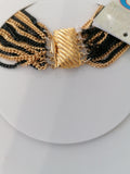 COLLANA MULTIFILI CATENINE NERO DORATO