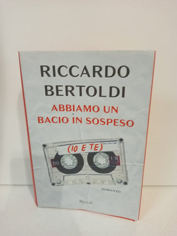 ABBIAMO UN BACIO IN SOSPESO - RICCARDO BERTOLI